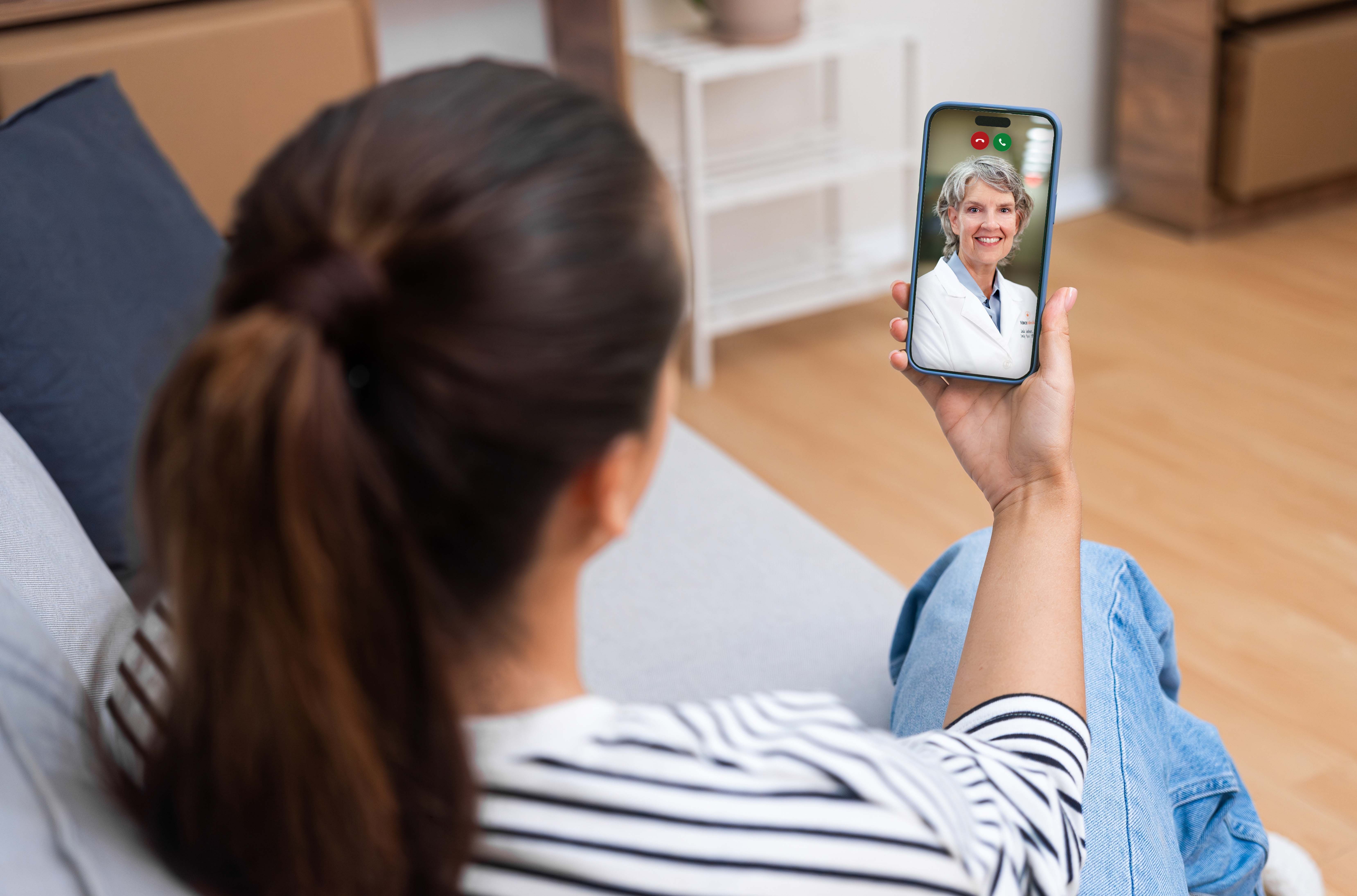 Patient using telehealth to meet with functional medicine nurse practitioner from home.